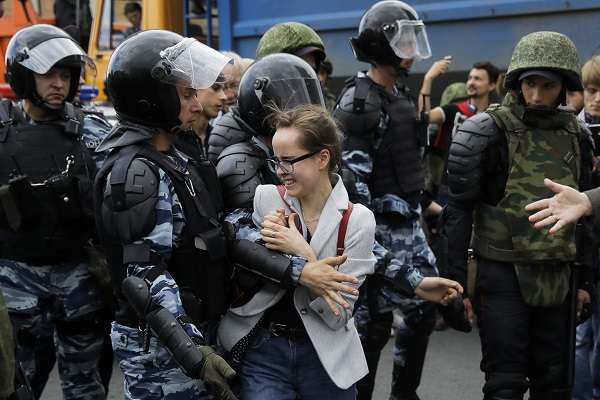 Riot Police Detain Protestors in Moscow and St. Petersburg