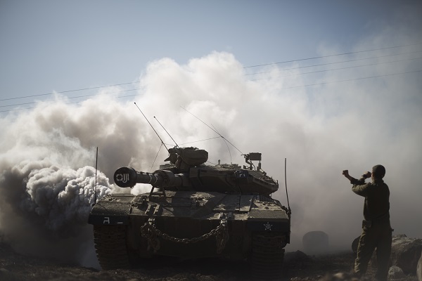 An Israeli Soldier Directs a Tank