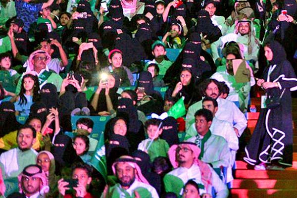 Families in a sports stadium in Saudi Arabia